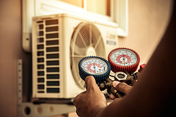 Professional Air Conditioning Service technician working in Pine City, MN